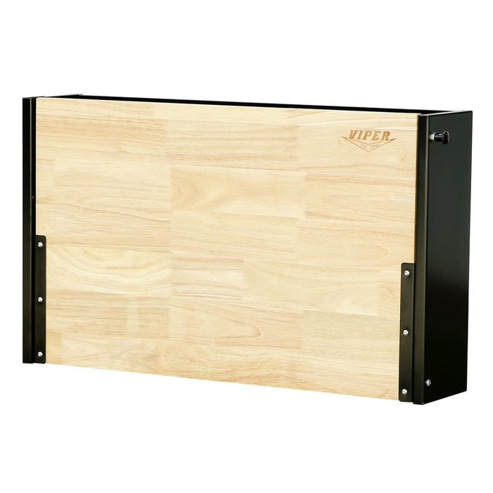 Folded view of black 32-inch folding wall-mounted steel worktable with butcher block surface