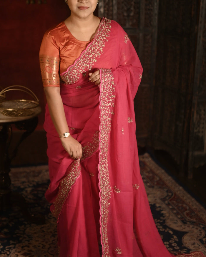 Amrapali fuchsia pink cotton saree, handcrafted with delicate zari work for a breathable festive and summer-ready look.