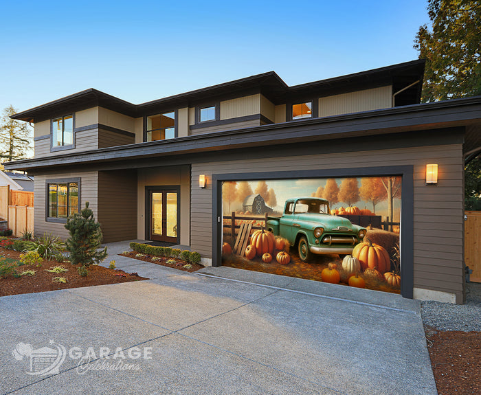 Modern house with a garage door featuring a vintage truck and pumpkins design.