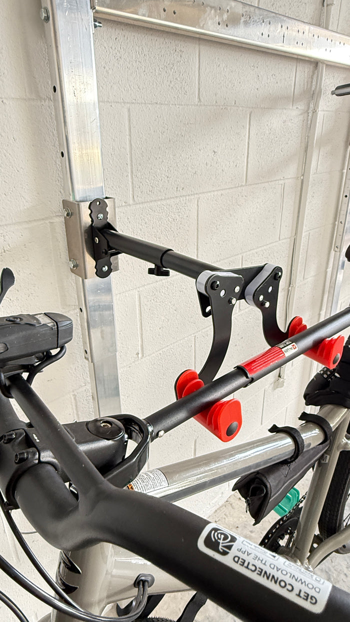 Bike hook accessory mounted on the freestanding ARackAbove rack for vertical garage bike storage