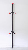 Freestanding bike storage pole for vertical bicycle storage without drilling | ABikeAbove
