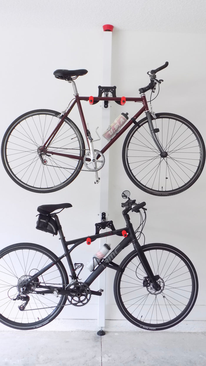 Freestanding bike storage pole for vertical bicycle storage without drilling | ABikeAbove