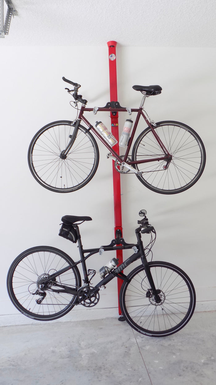 Freestanding bike storage pole for vertical bicycle storage without drilling | ABikeAbove