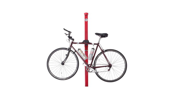 Freestanding bike storage pole for vertical bicycle storage without drilling | ABikeAbove