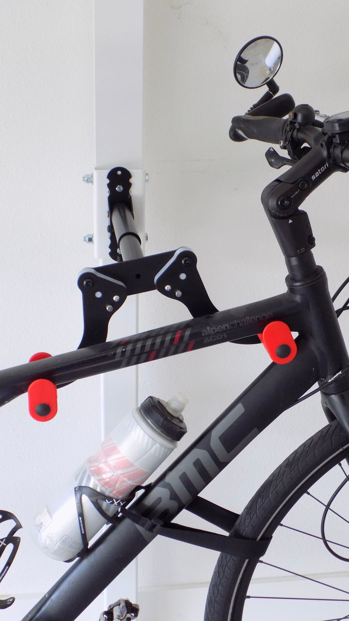 Freestanding bike storage pole for vertical bicycle storage without drilling | ABikeAbove