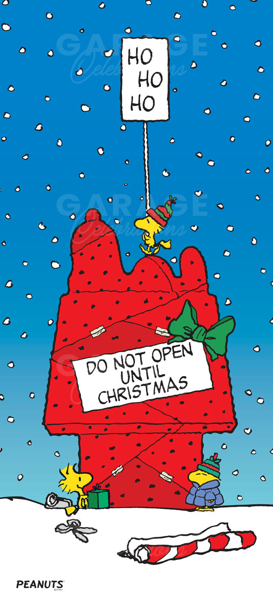 Christmas-themed design featuring Snoopy and other Peanuts characters on top of a a red dog house wrapped up like a gift and sign that reads "Do not open until Christmas."