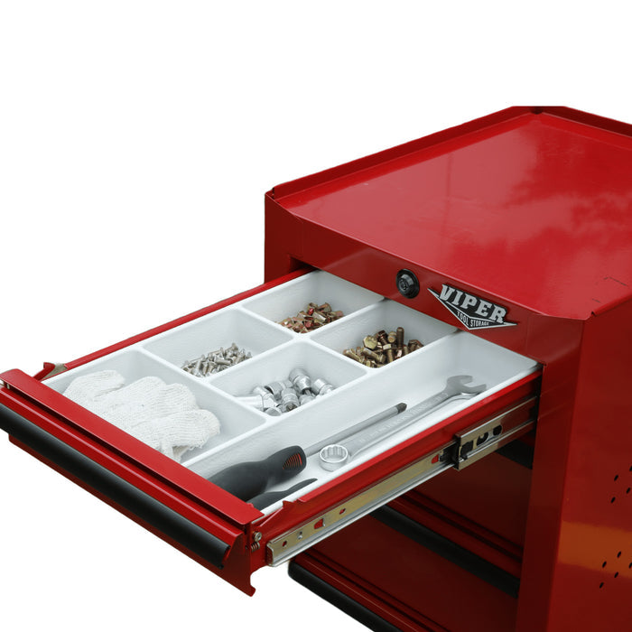 Open-drawer view of red salon cart showing plastic drawer organizer tray with hardware and hand tools