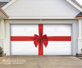 Garage door  with large red ribbon with a bow on a white farmhouse garage door background.
