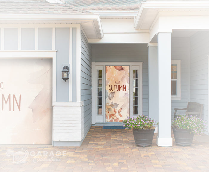 Front entrance of a house with a decorative autumn sign on the door.