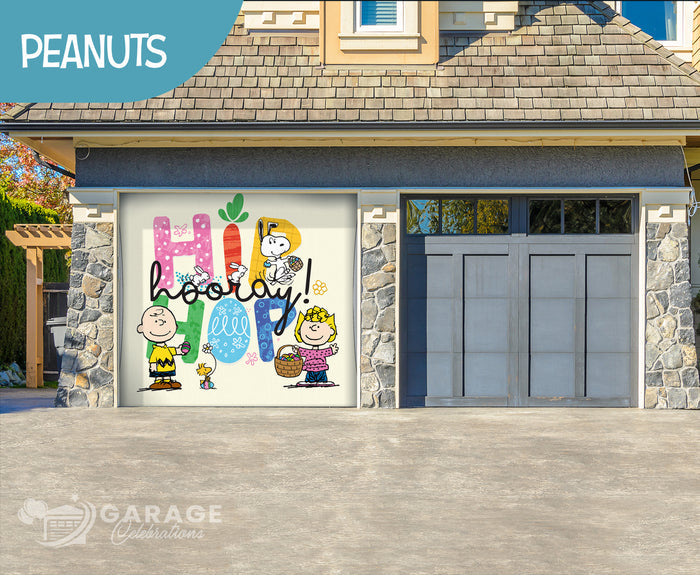 A decorative garage door cover featuring characters from Peanuts, including Snoopy, Charlie Brown, and Woodstock, with the text 'Hip Hop Hooray!' on a spring-themed background.