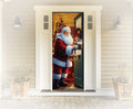 Decorative door with a Santa Claus design on a white house exterior.