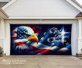 Decorative garage door with an American flag and eagle design, featuring 'God Bless America'.
